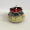 Crystal Burgess - Torzan fired candle
