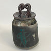 Crystal Burgess - Raku jar with lid - "Love"