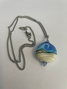 Garry White (Glass in Motion) - Necklace - Lampwork pendant - Round - matte blue and cream - Garry White - Glass in Motion - Jewellery - McMillan Arts Centre & MAC Box Office