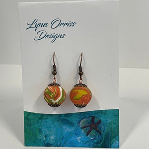 Lynn Orriss - Earrings - Orange swirl balls on copper hooks