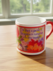 Load image into Gallery viewer, Linda Greig - Magic Mug - &quot;To Plant a Garden is to Believe in Tomorrow&quot;
