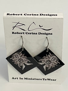 Robert Cerins - Earrings - White creature on black - Diamond - Robert Cerins - McMillan Arts Centre Gallery, Gift Shop and Box Office - Vancouver Island Art Gallery