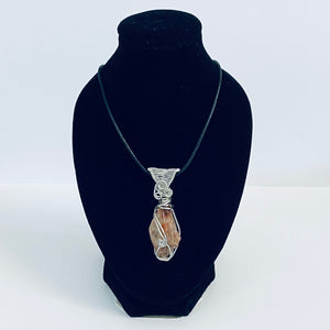 Quicksilver Creations - Pendant - Red Calcite, silver plated wrap with 16" black cord