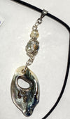 Mary Flores- Pendant Porcelain beads, glass crystal on cord