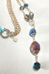Mary Flores- Pendant Porcelain beads with crystals on chain