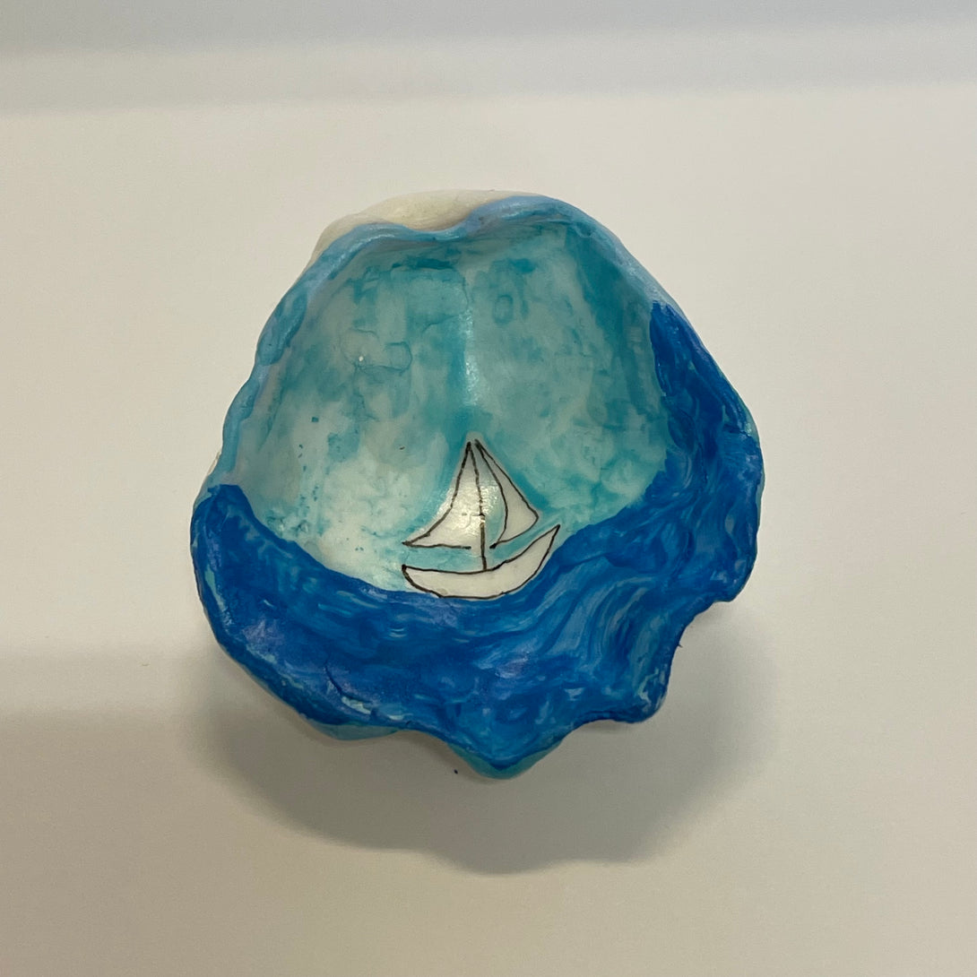Dana Wagner - Rock Art -Small oyster shell, sailboat - Dana Wagner - McMillan Arts Centre Gallery, Gift Shop and Box Office - Vancouver Island Art Gallery