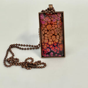 Linda Campbell -Pendant - Large Rectangle -pink & orange, on copper chain by Linda Campbell - McMillan Arts Centre - Vancouver Island Art Gallery