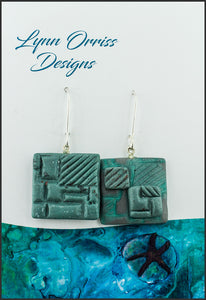 Lynn Orriss - Earrings square turquoise and silver with graphic design, French lever hook by Lynn Orriss - McMillan Arts Centre - Vancouver Island Art Gallery