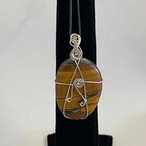 Quicksilver Creations - Pendant - Tigers Eye silver plated wrap with 16" cord
